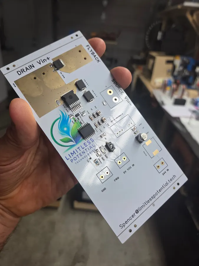 Limitless Potential pulse driver PCB held in hand